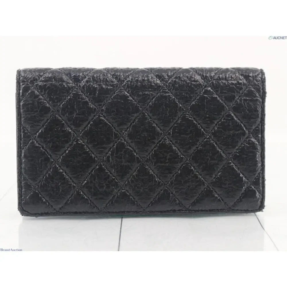 5909 - Chanel Matelasse Coco Button bi-fold wallet